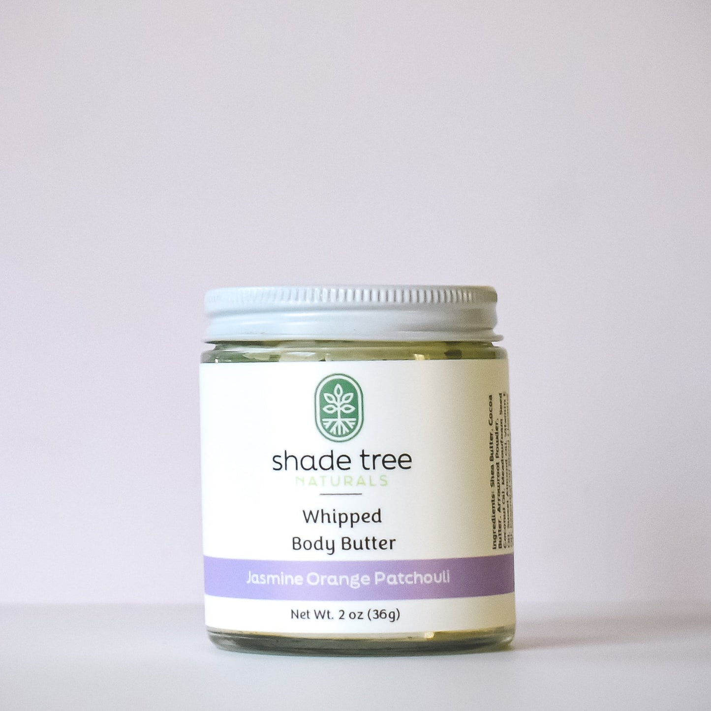 Jar of Shade Tree Whipped Body Butter on a light gray background