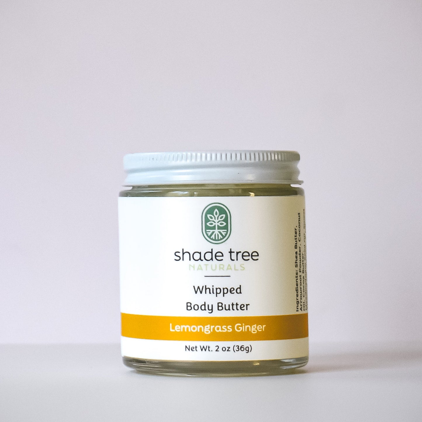 Jar of Shade Tree Naturals Whipped Body Butter on a light gray background