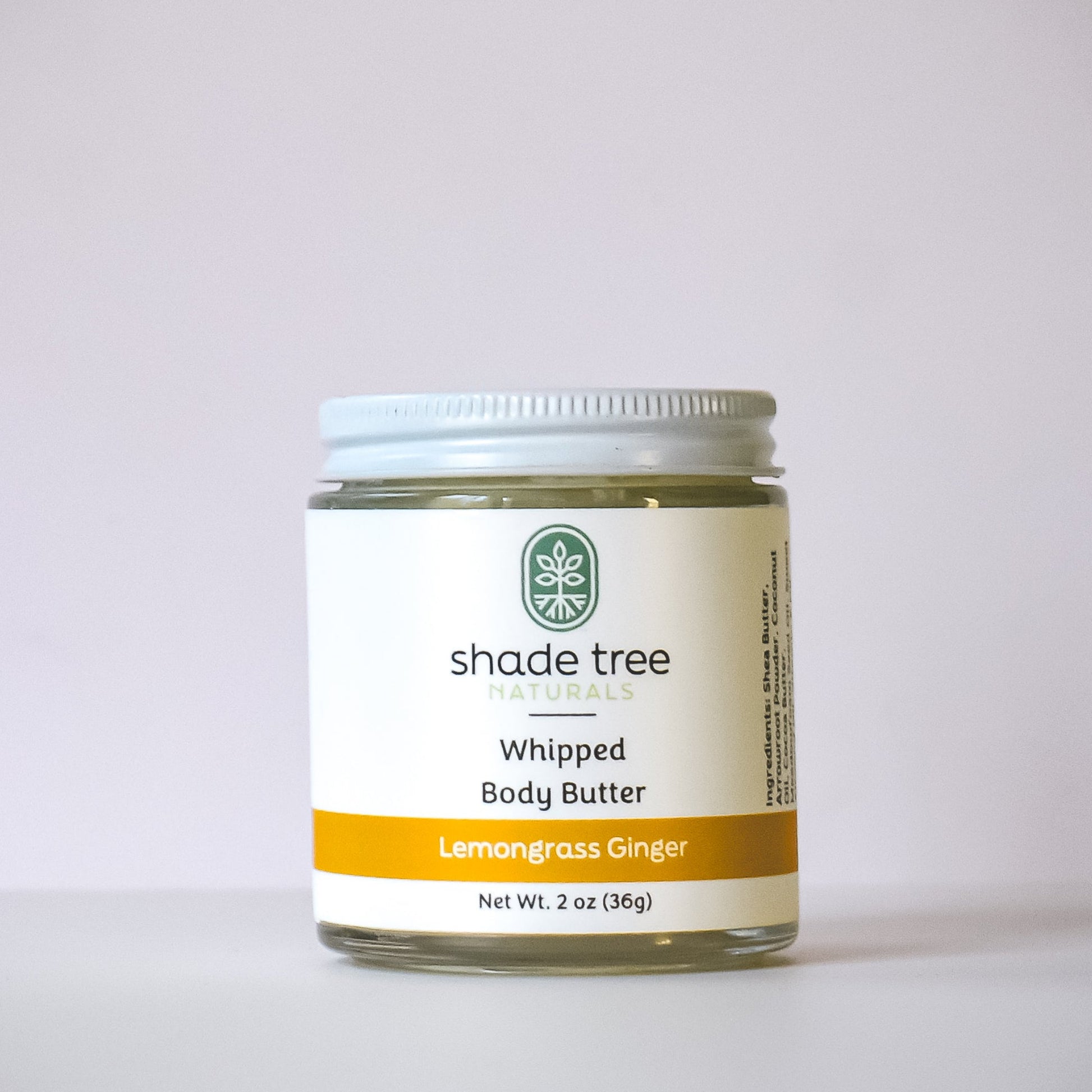 Jar of Shade Tree Naturals Whipped Body Butter on a light gray background