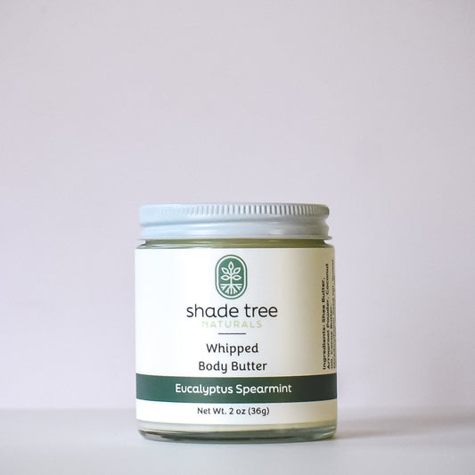 Jar of Shade Tree Naturals whipped body butter on a light gray background